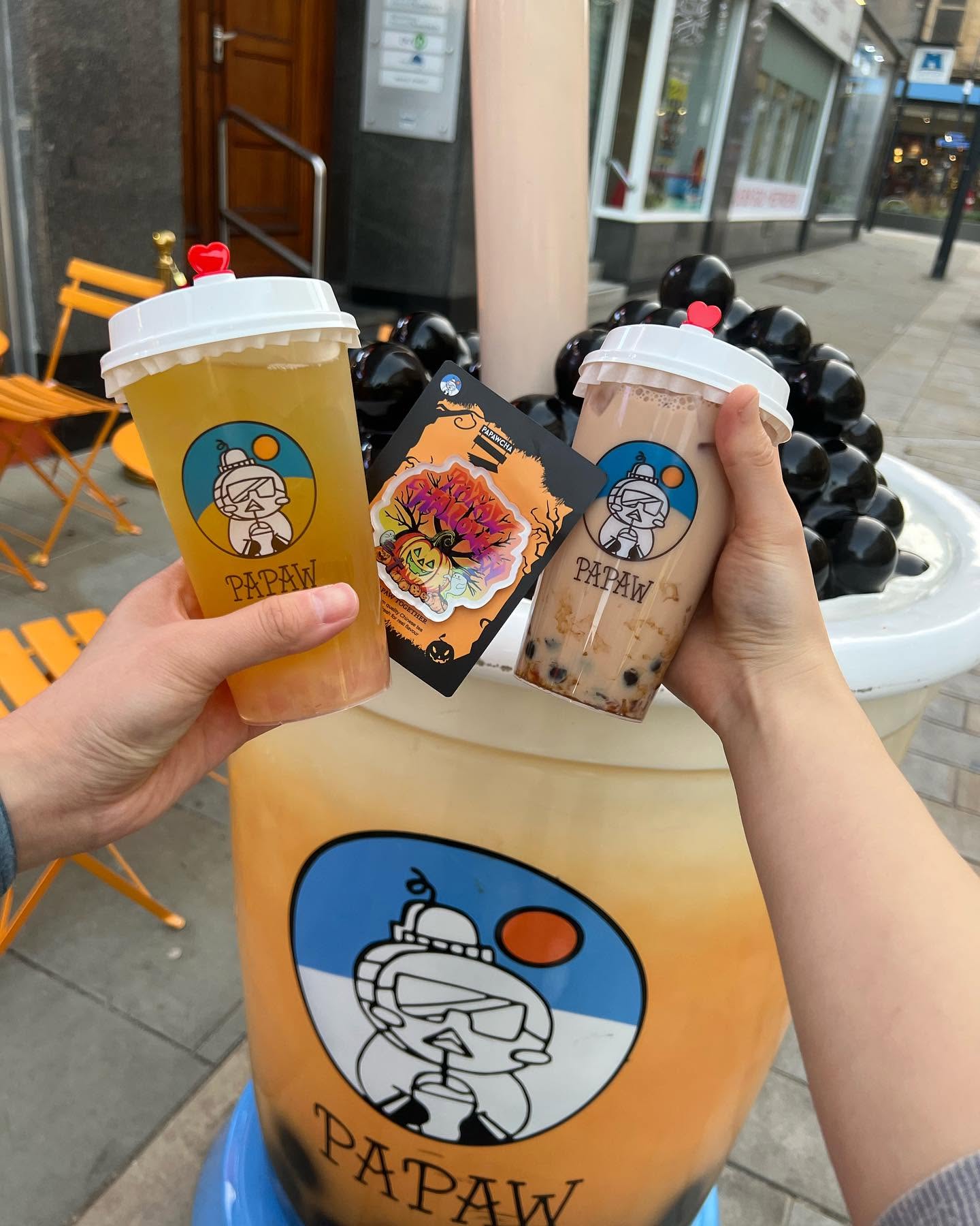 Two Papawcha drinks outside the shop